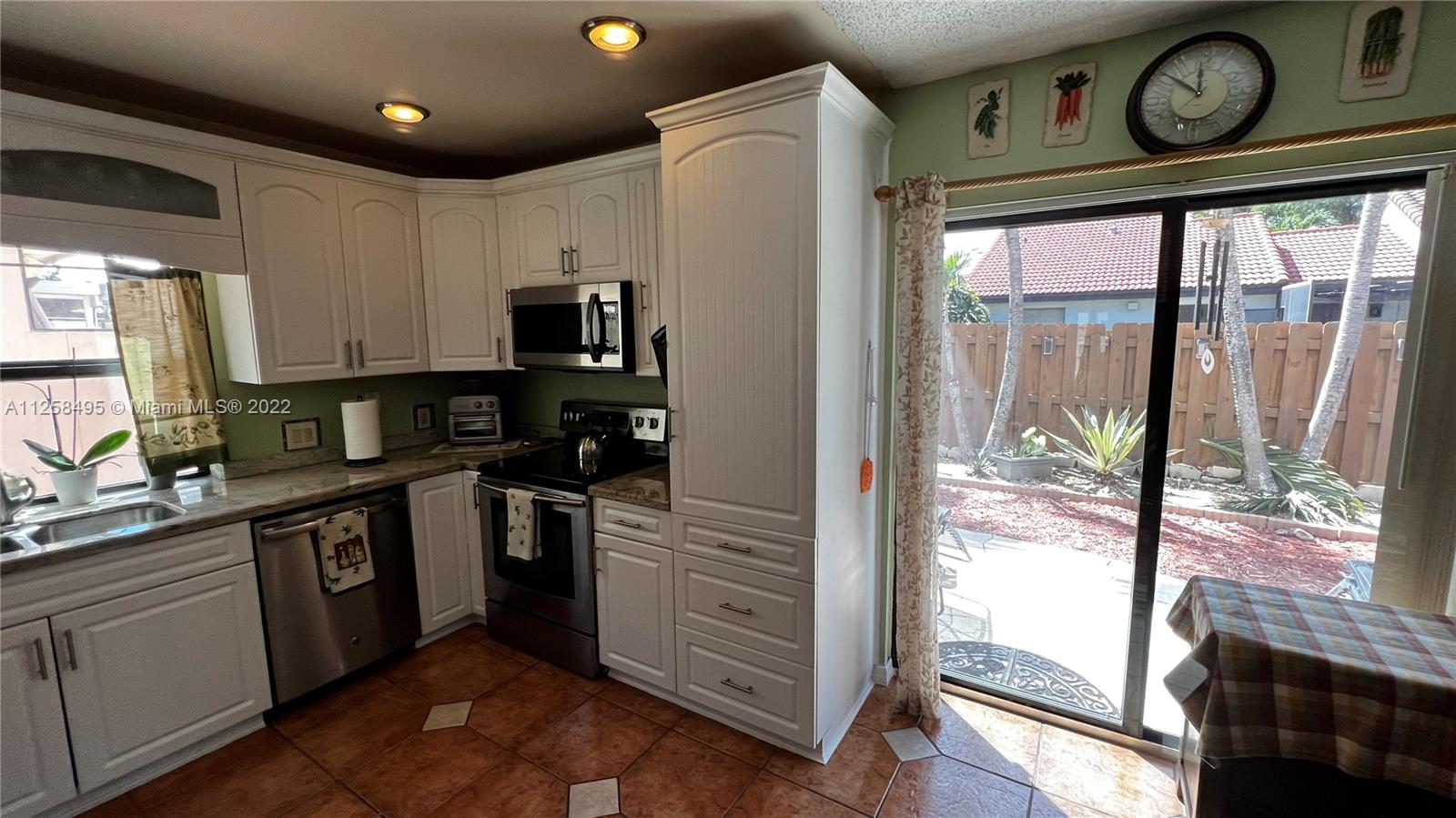 Kitchen with Sliding Doors to Back Patio