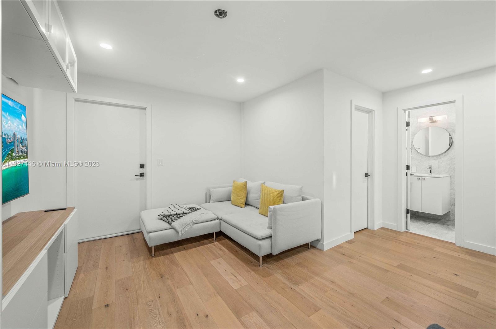 Separate laundry room & custom cabinetry and sink