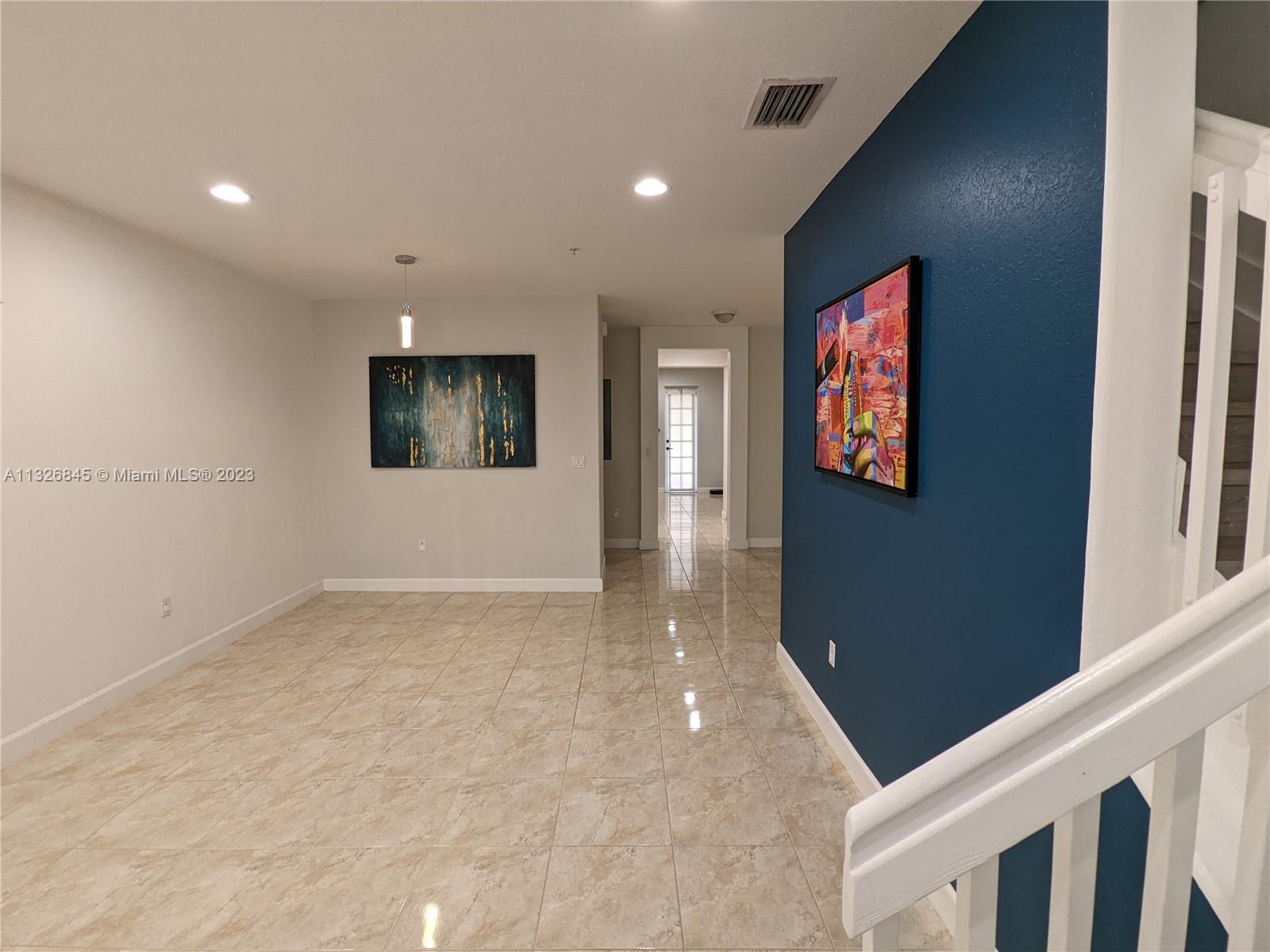 Foyer/Second Staircase Entrance