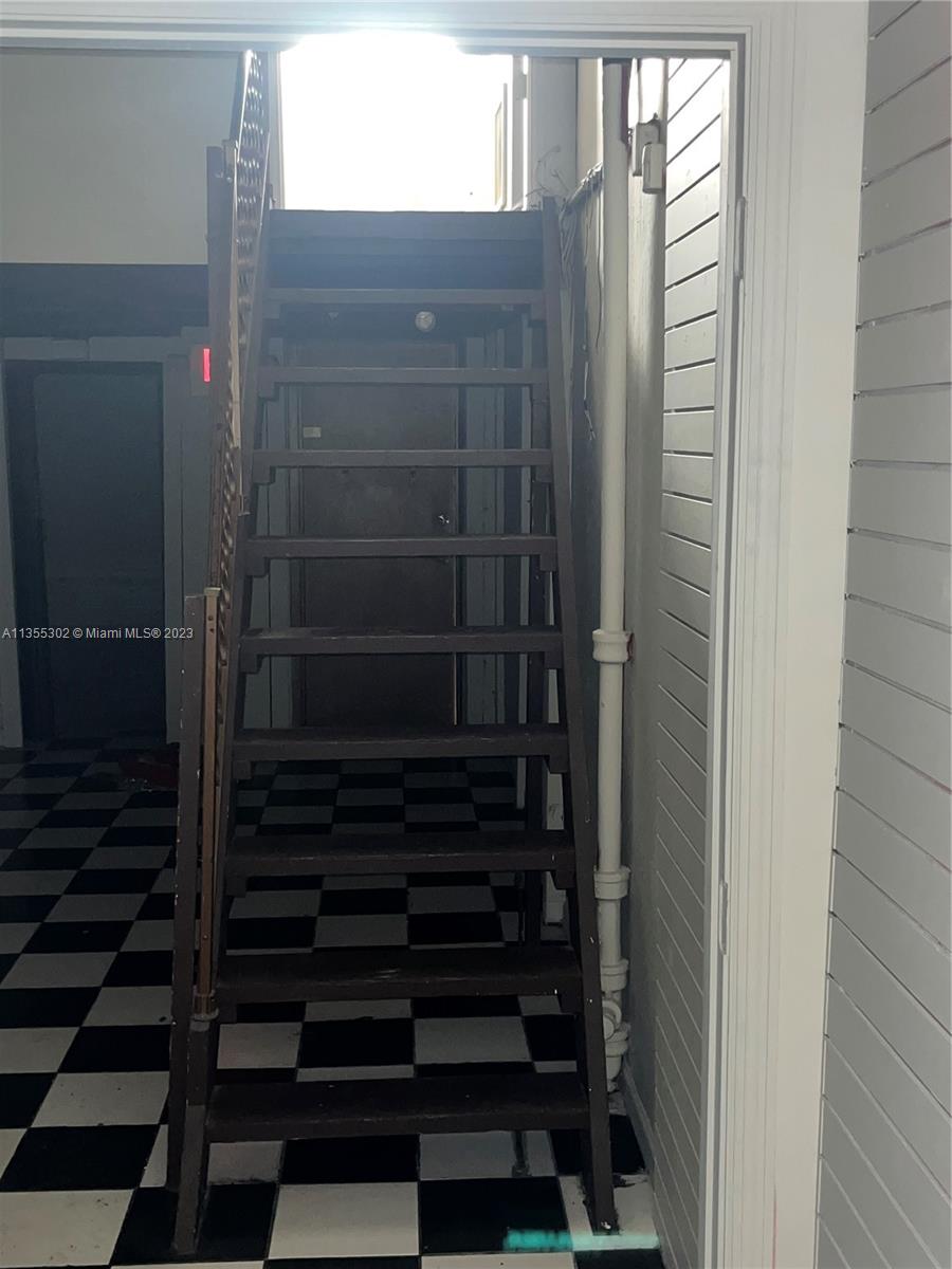 VIEW OF STAIRS TO LOFT