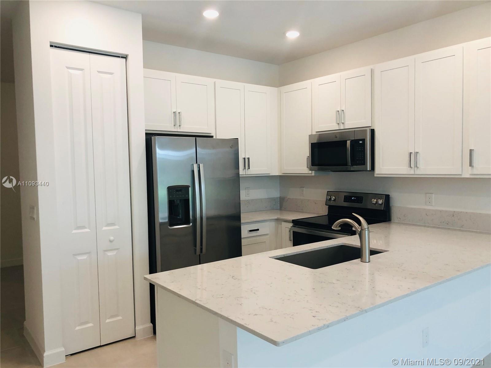 Beautiful kitchen with stainless steel appliances