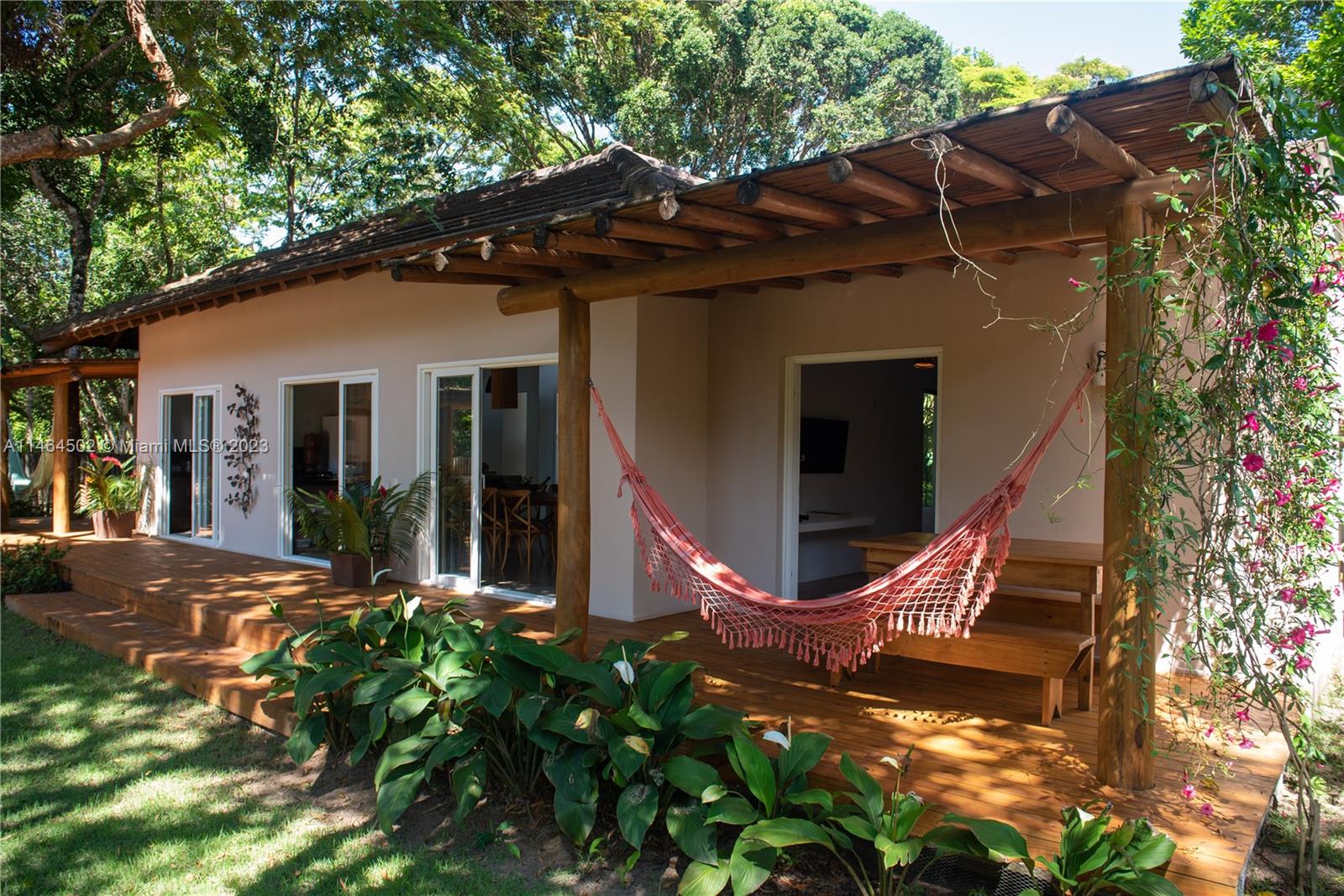 Deck to 2 rooms and living/kitchen