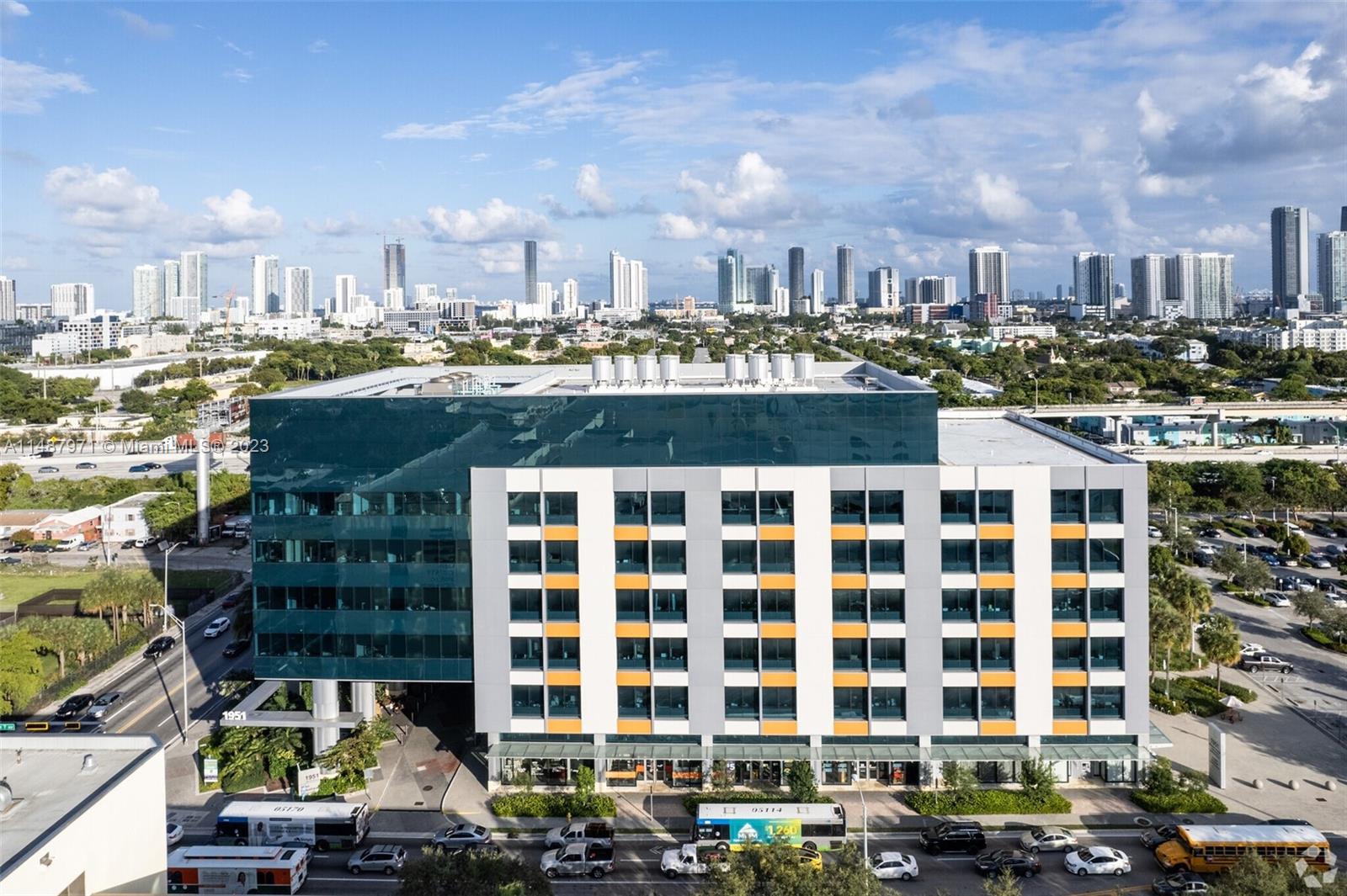 Miami's Converge Health Tech Office Building at 1951 NW 7th Ave has beautiful city skylines