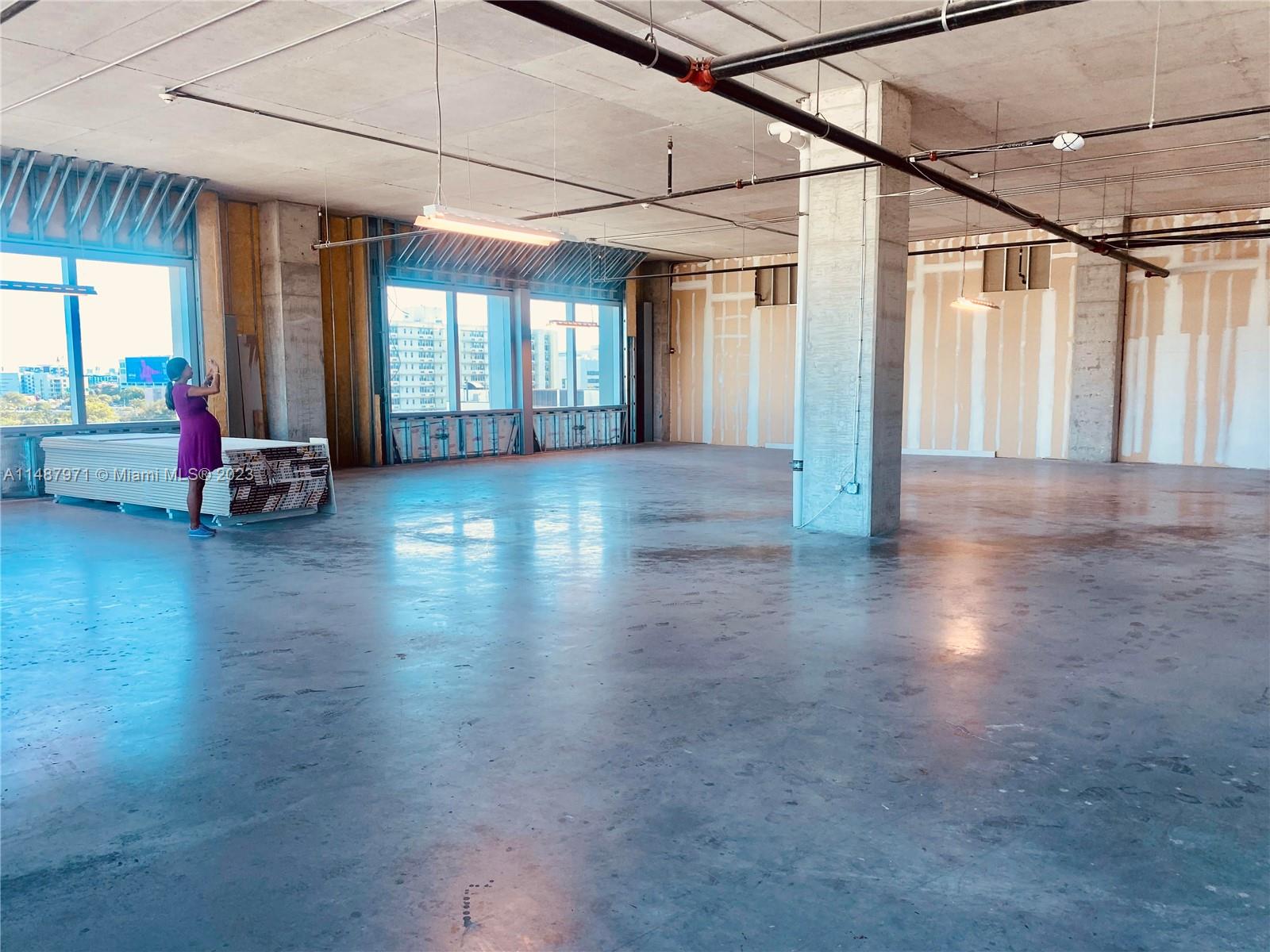 Raw open floor plan Science Lab / Office