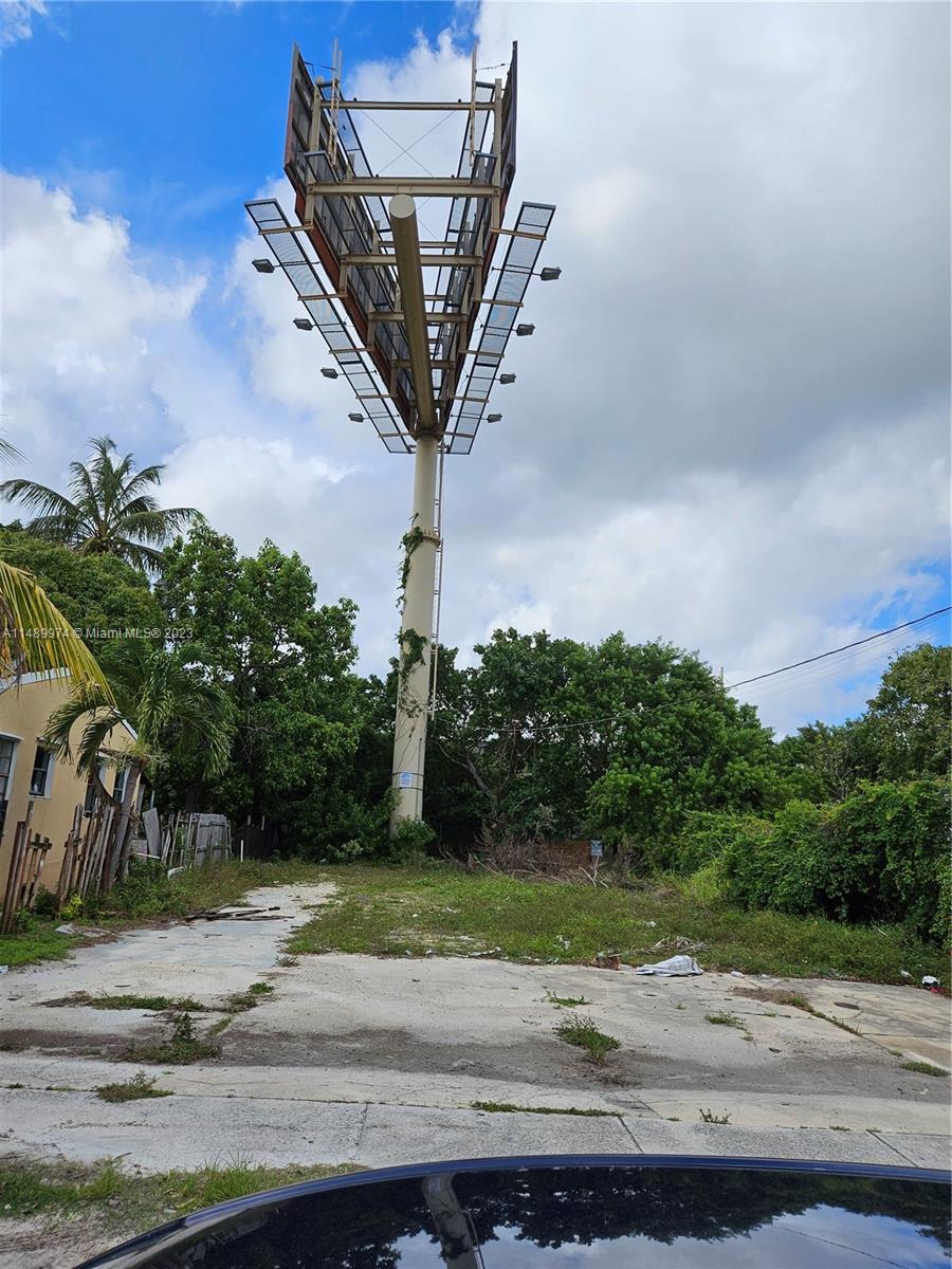 Lot with Billboard at 321 NW 37 St Miami FL 33127 looking north