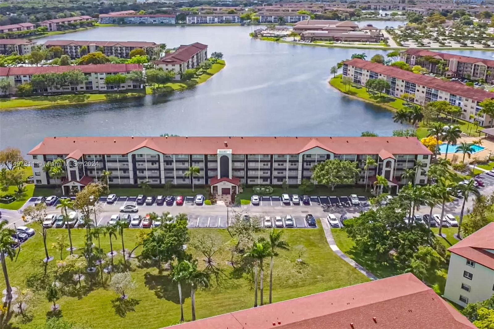 Hawthorne D109 Resort Living Awaits You! Front of Building View-Wide Lake & Garden Views