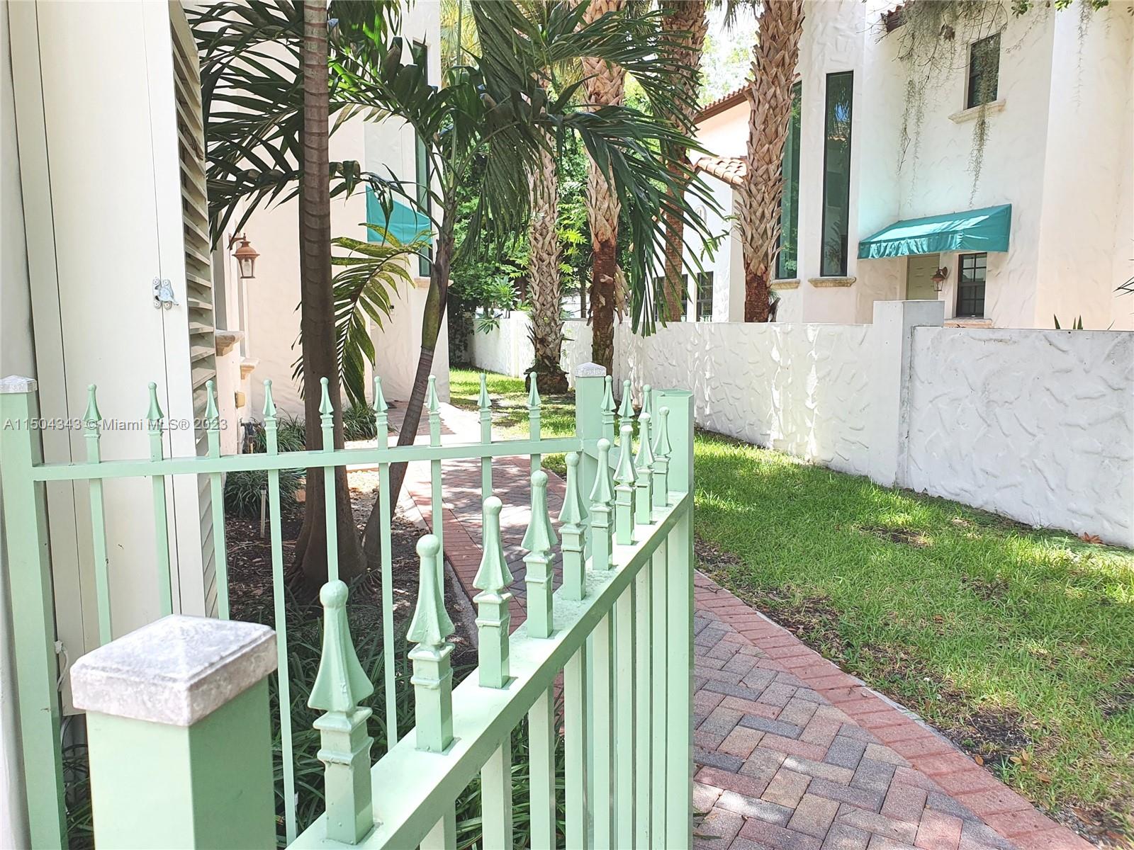 The gate gives access to the side of the property and leads towards the front door.