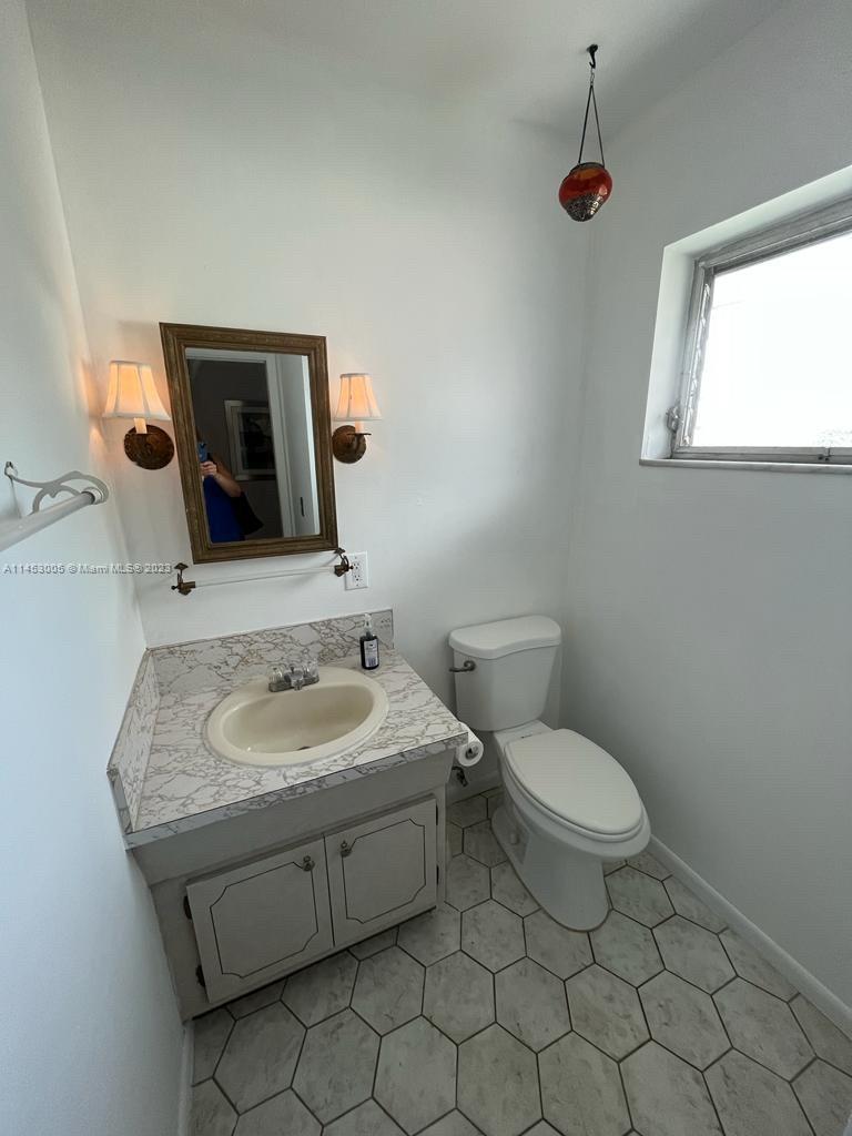 Half bath off the hallway.