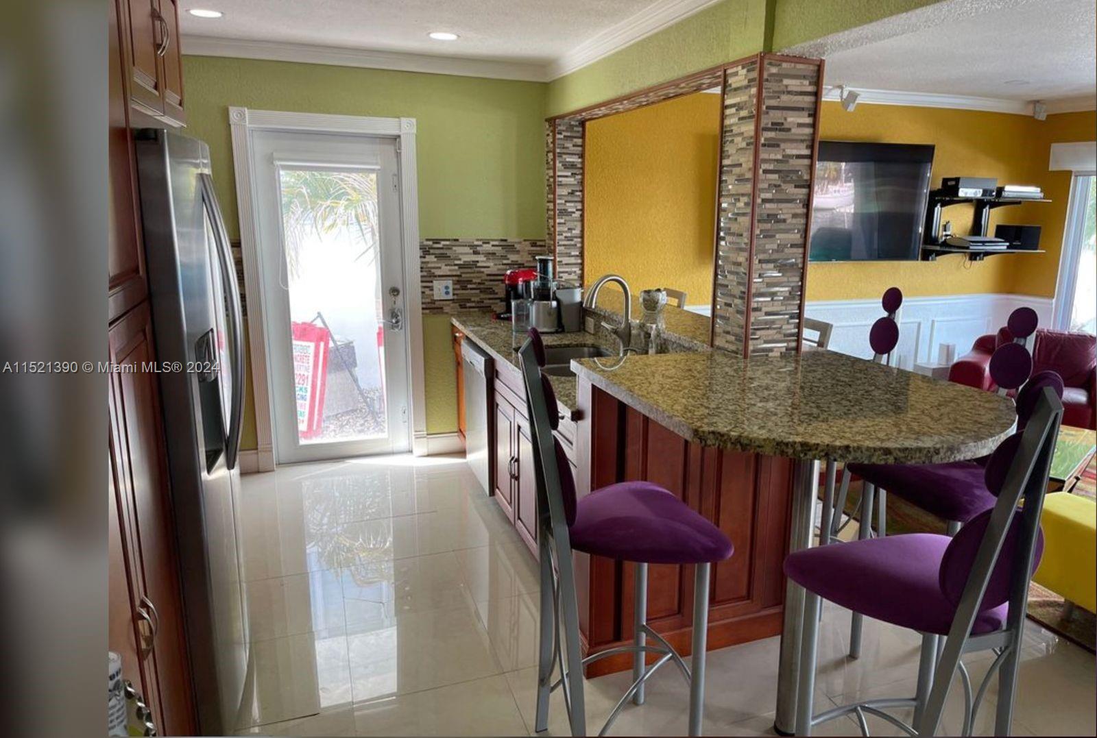 unit 3 kitchen view porcelain floors w/natural light