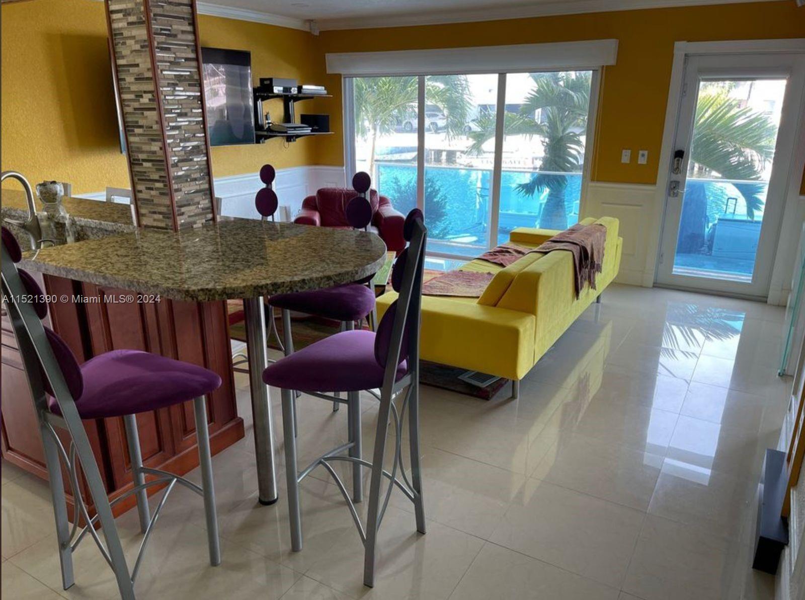 unit 3 kitchen bar and living water/dock view