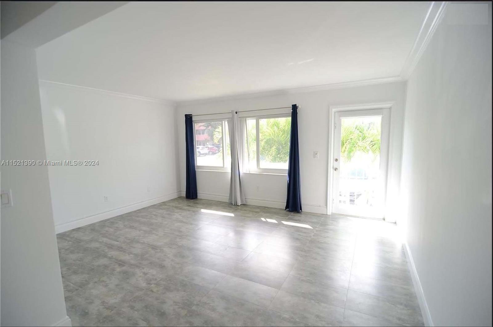 unit 1 living room view from dining natural light