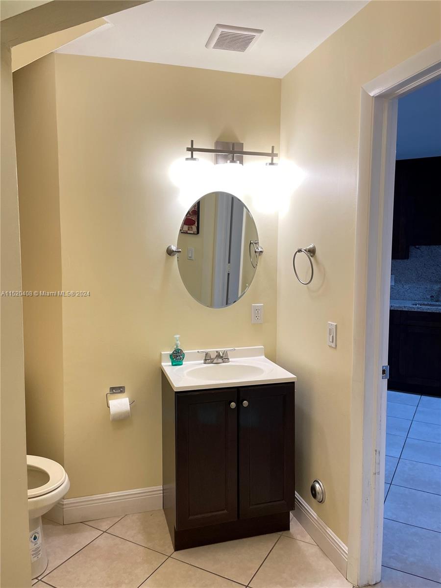 1st floor 1/2 bath, located in laundry room
