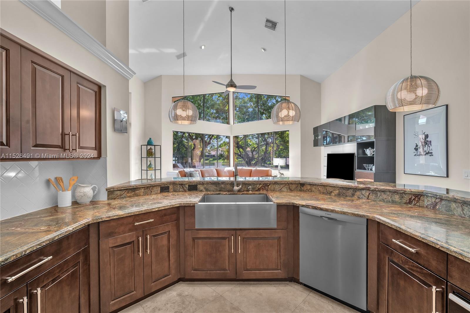 Chef's dream kitchen. Lots of counterspace. Enjoy the lake and pool views.