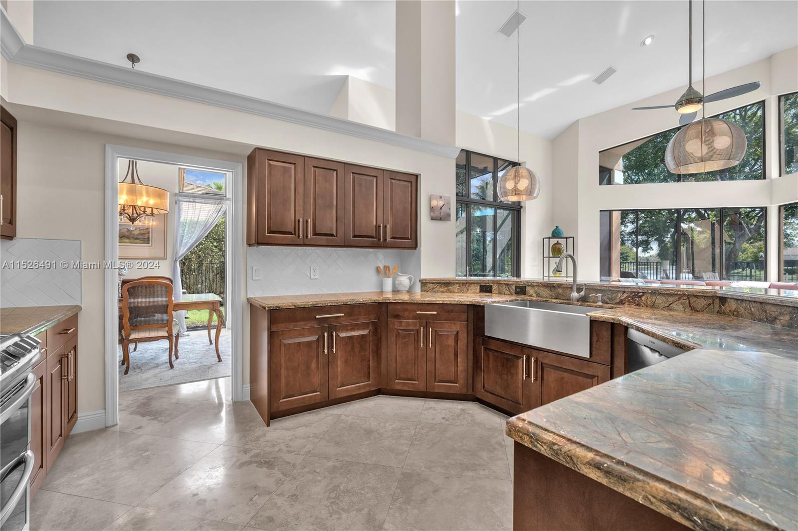 Gourmet kitchen with farmhouse sink and new appliances.