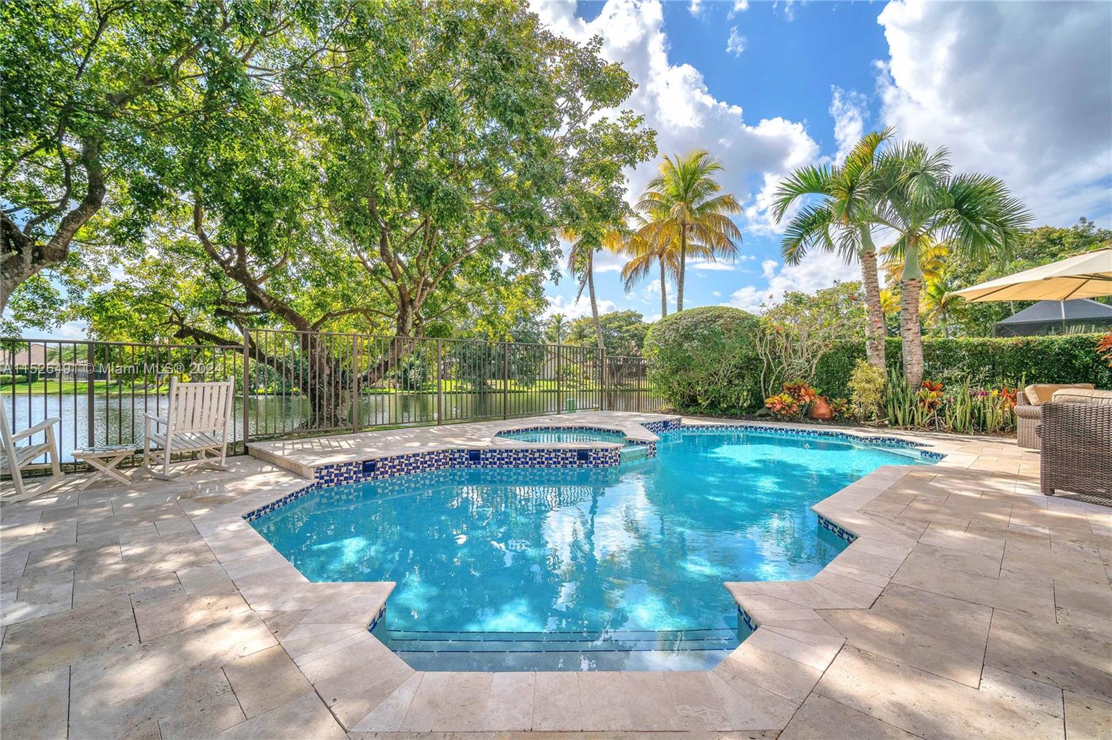 Travertine pavers, plenty of yard, fully fenced, stunning views!