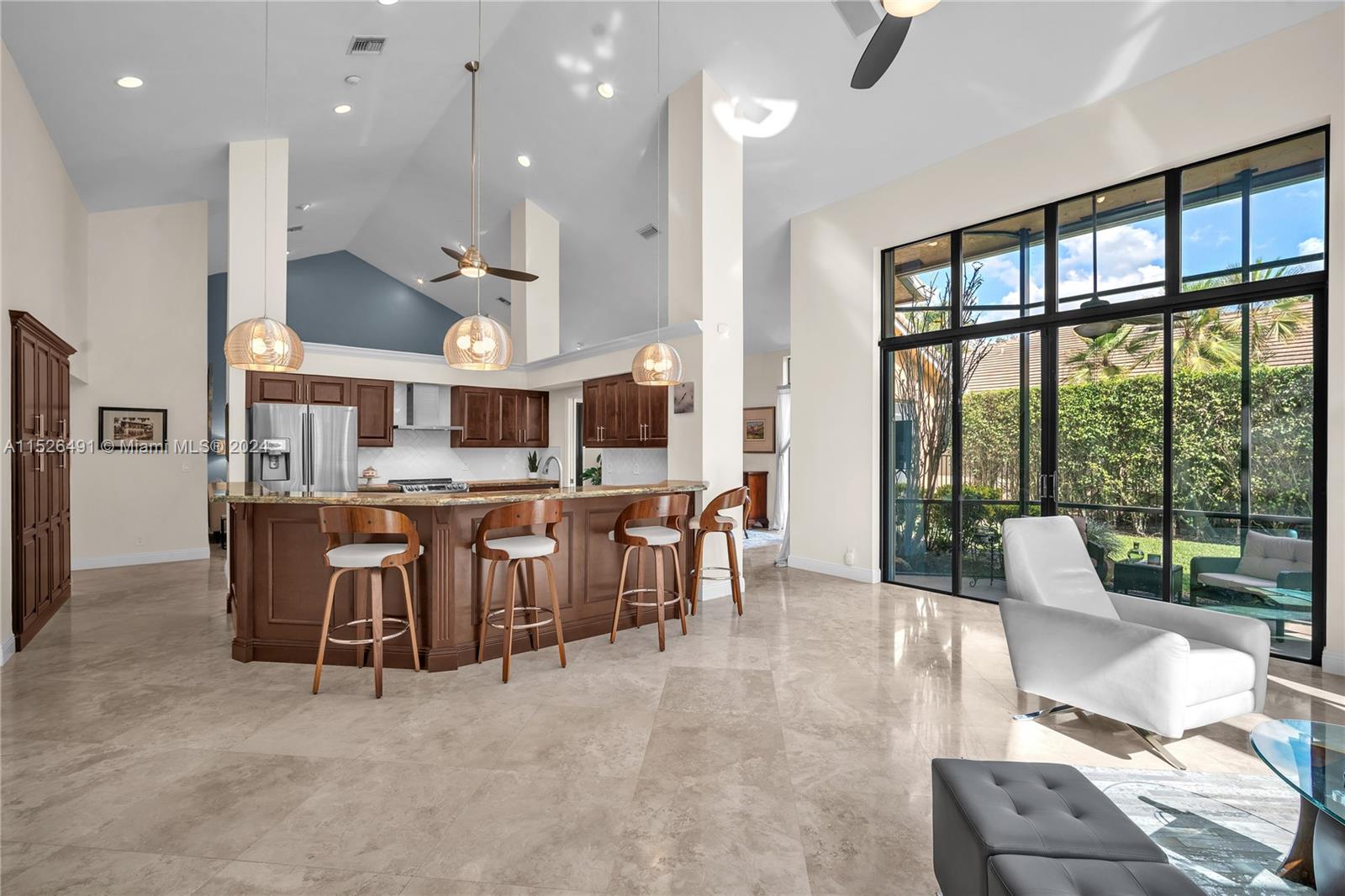 Open floorplan; new SS appliances, stove, dishwasher, microwave & hood.  New tiled backsplash