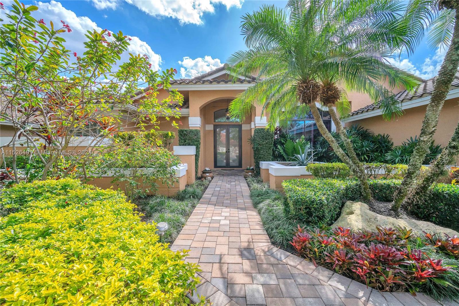 Situated in beautiful boutique Tequesta Pointe with manicured landscaping & new brick paver drive that creates beautiful curb appeal!
