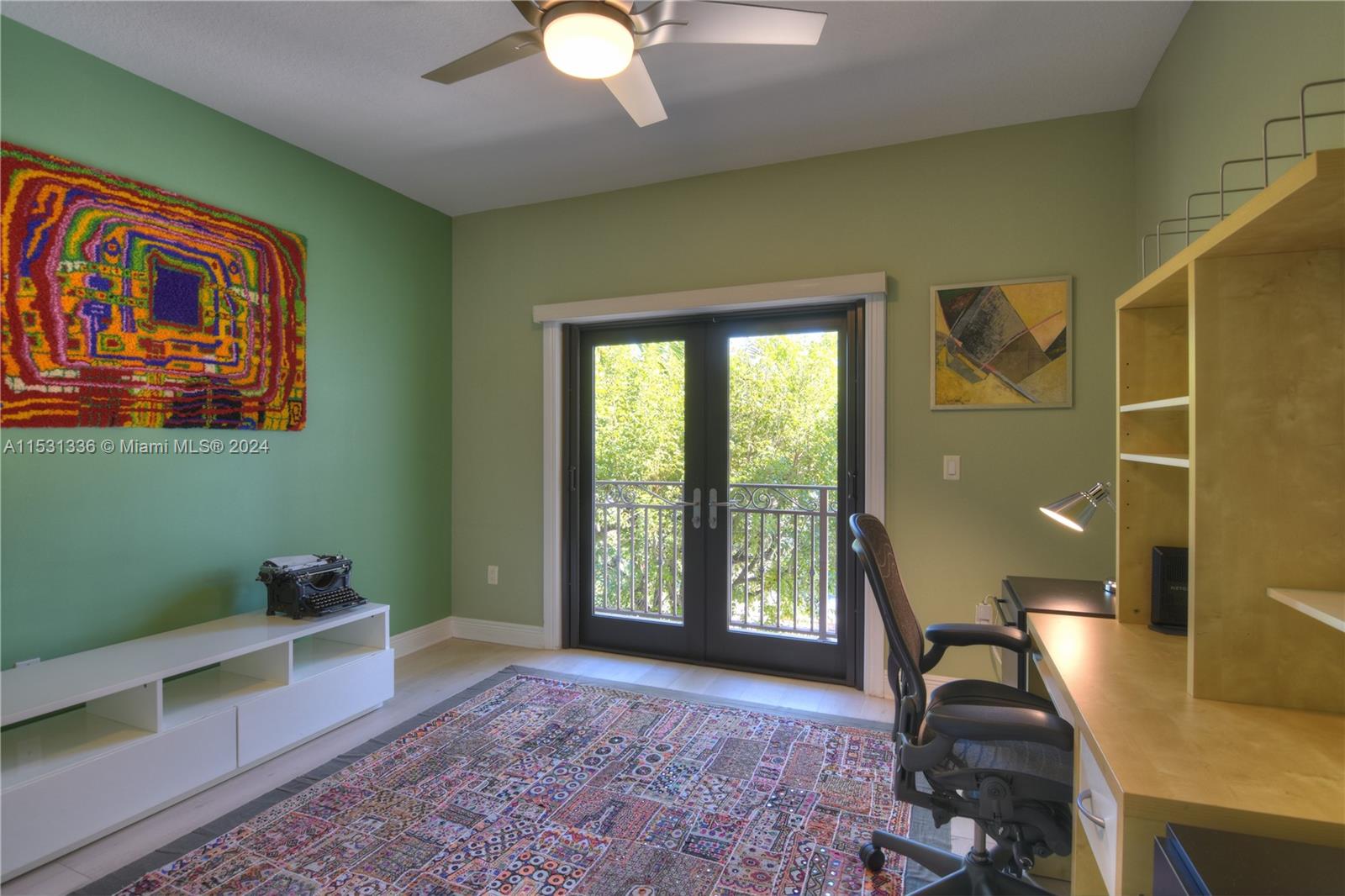 3rd bedroom has balcony and  new Hunter Douglas blinds on windows