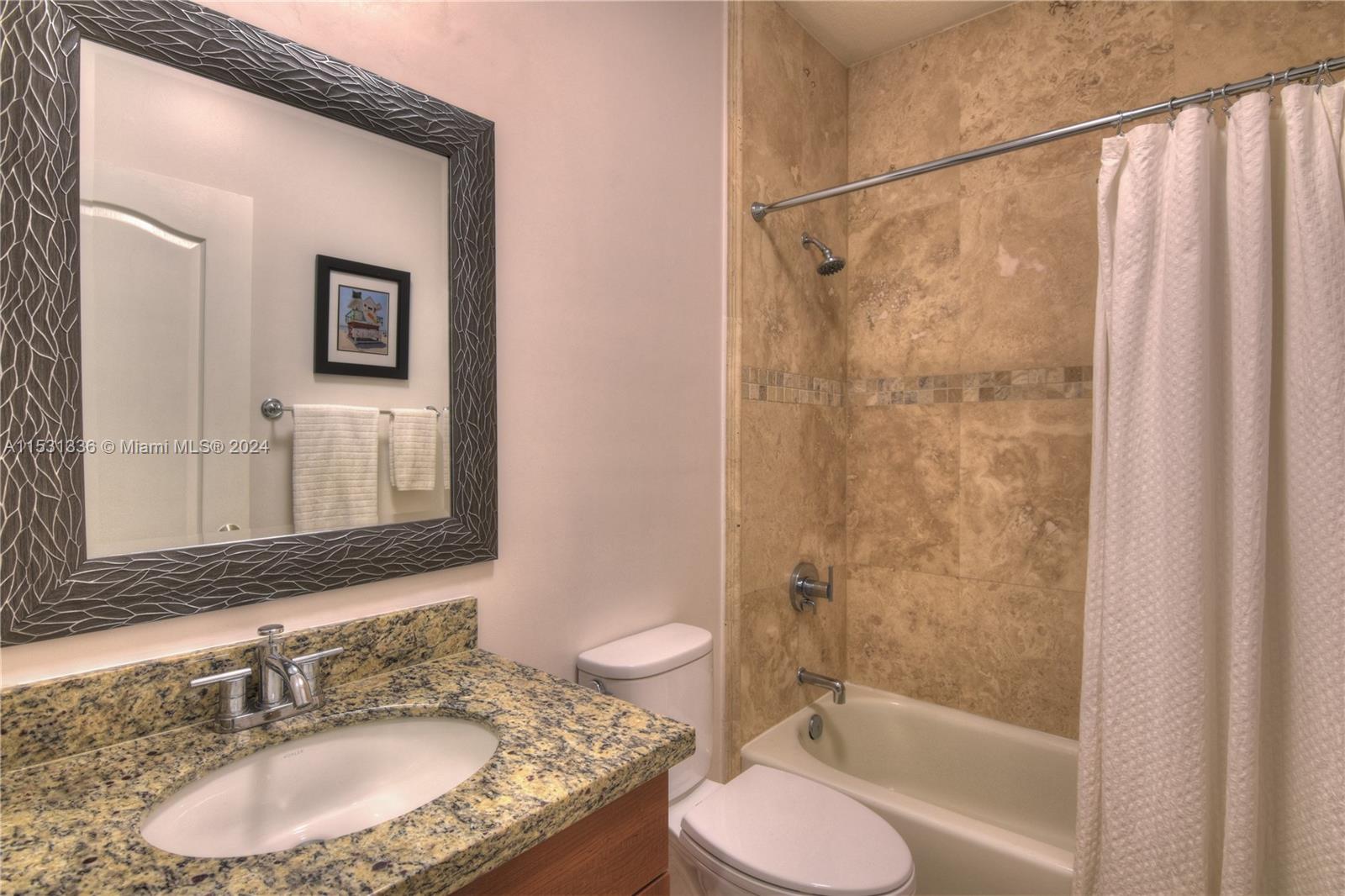 3rd bathroom upstairs with shower/tub