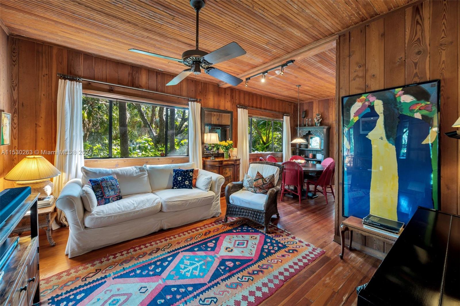 The house is graced by a track of nature which is owned by the city. Mature trees graces this home.