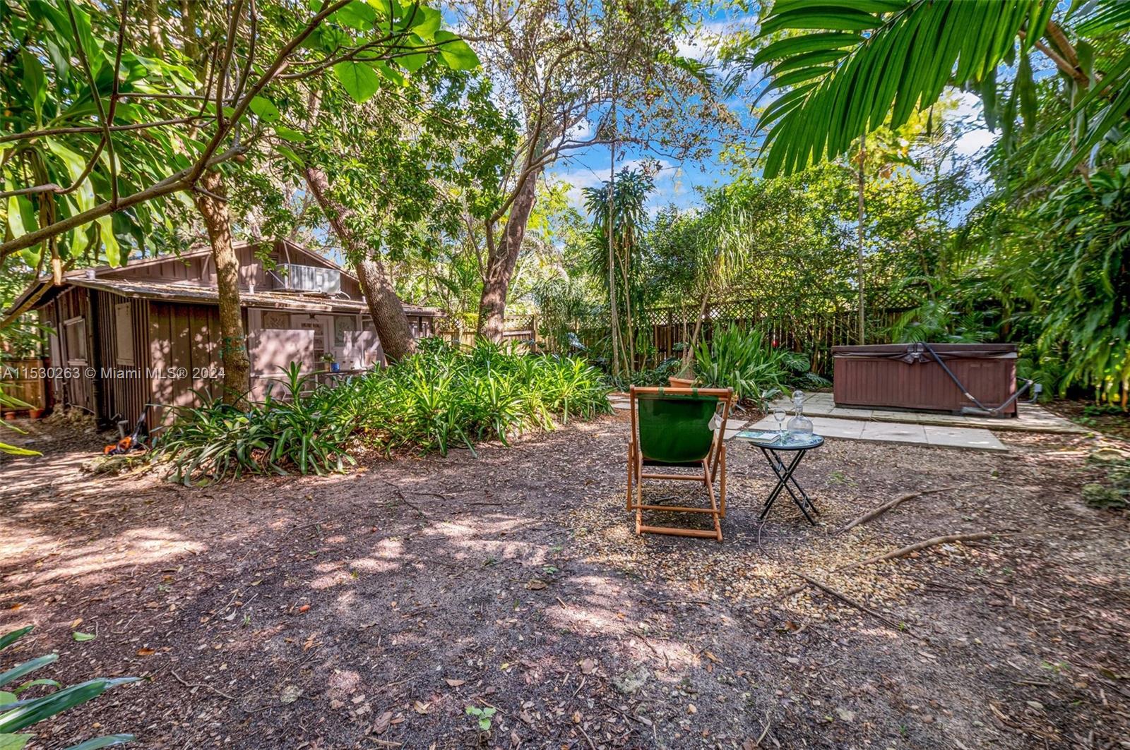 Back yard with a jacuzzi