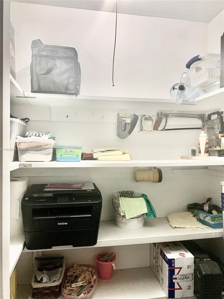TONS OF STORAGE IN WALK IN PANTRY
