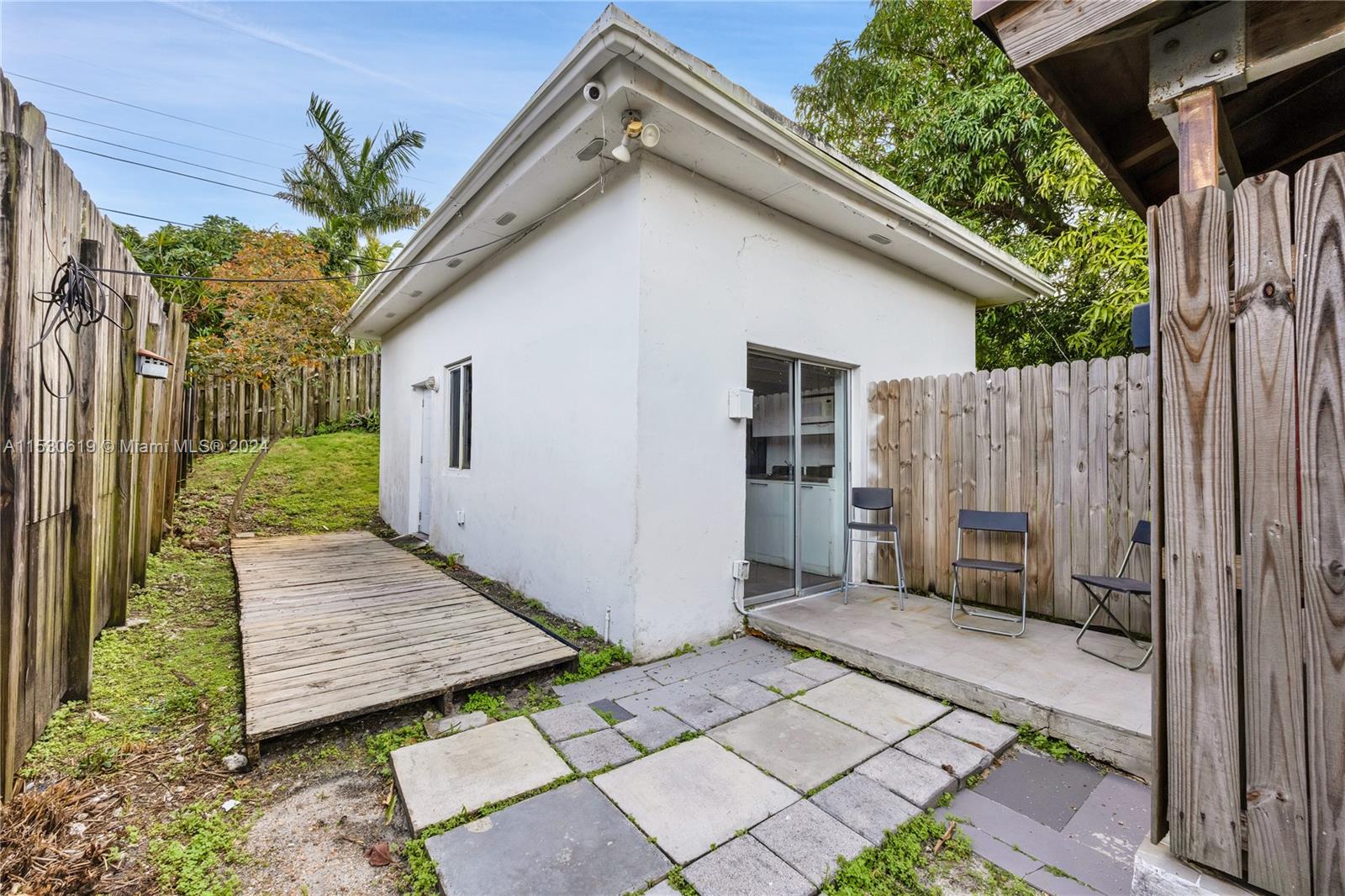 Cottage with small private patio off kitchen