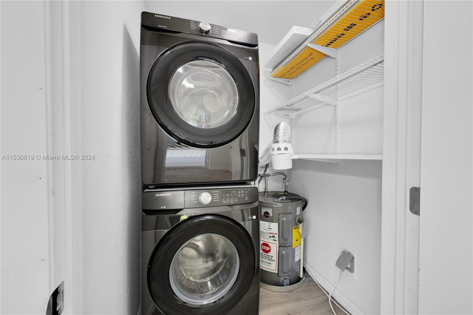 Laundry Closet with newer stackables