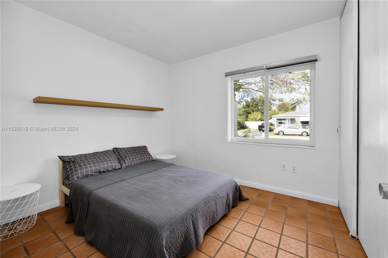Bedroom with impact windows.