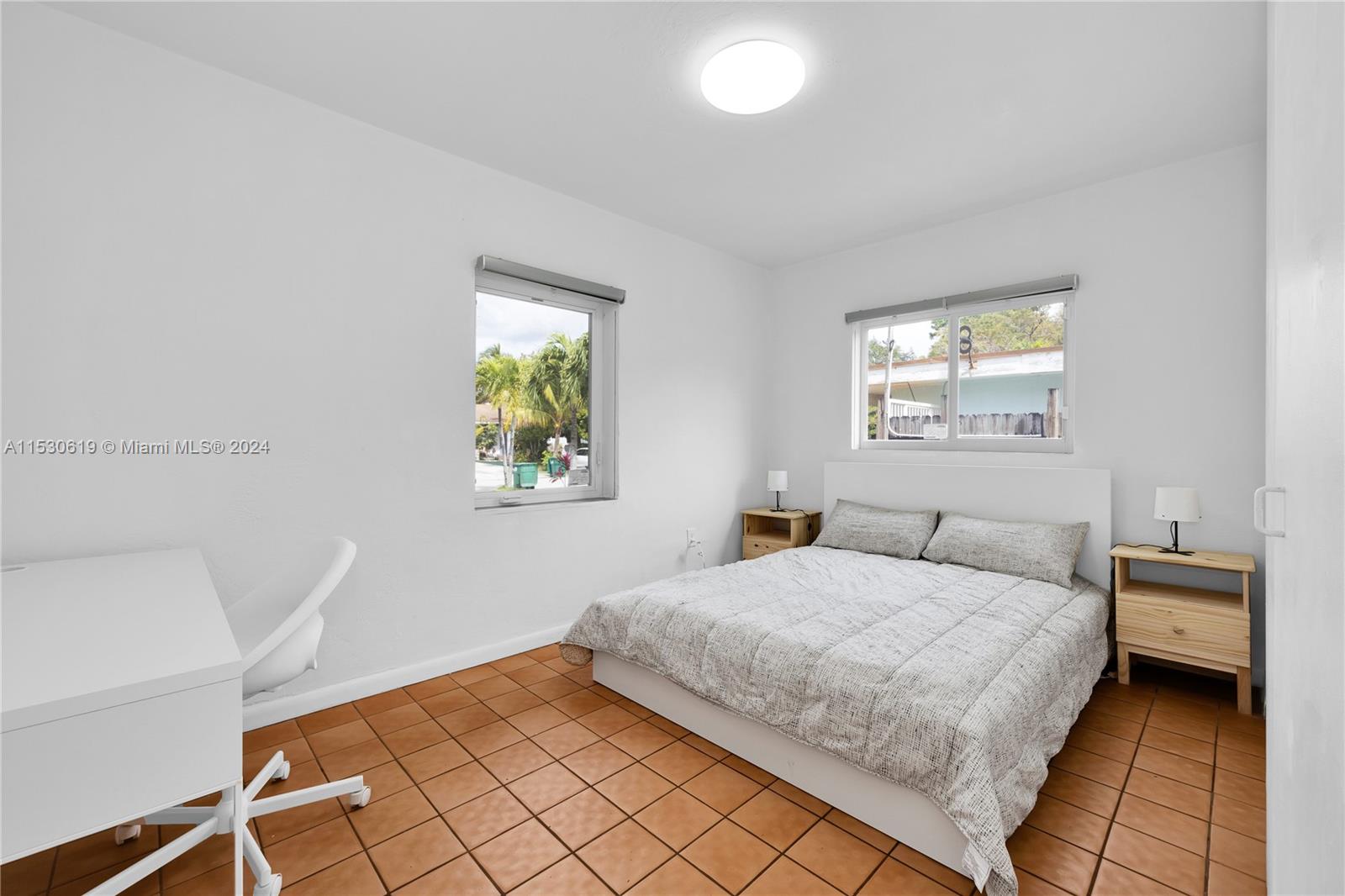 Bedroom with impact windows.