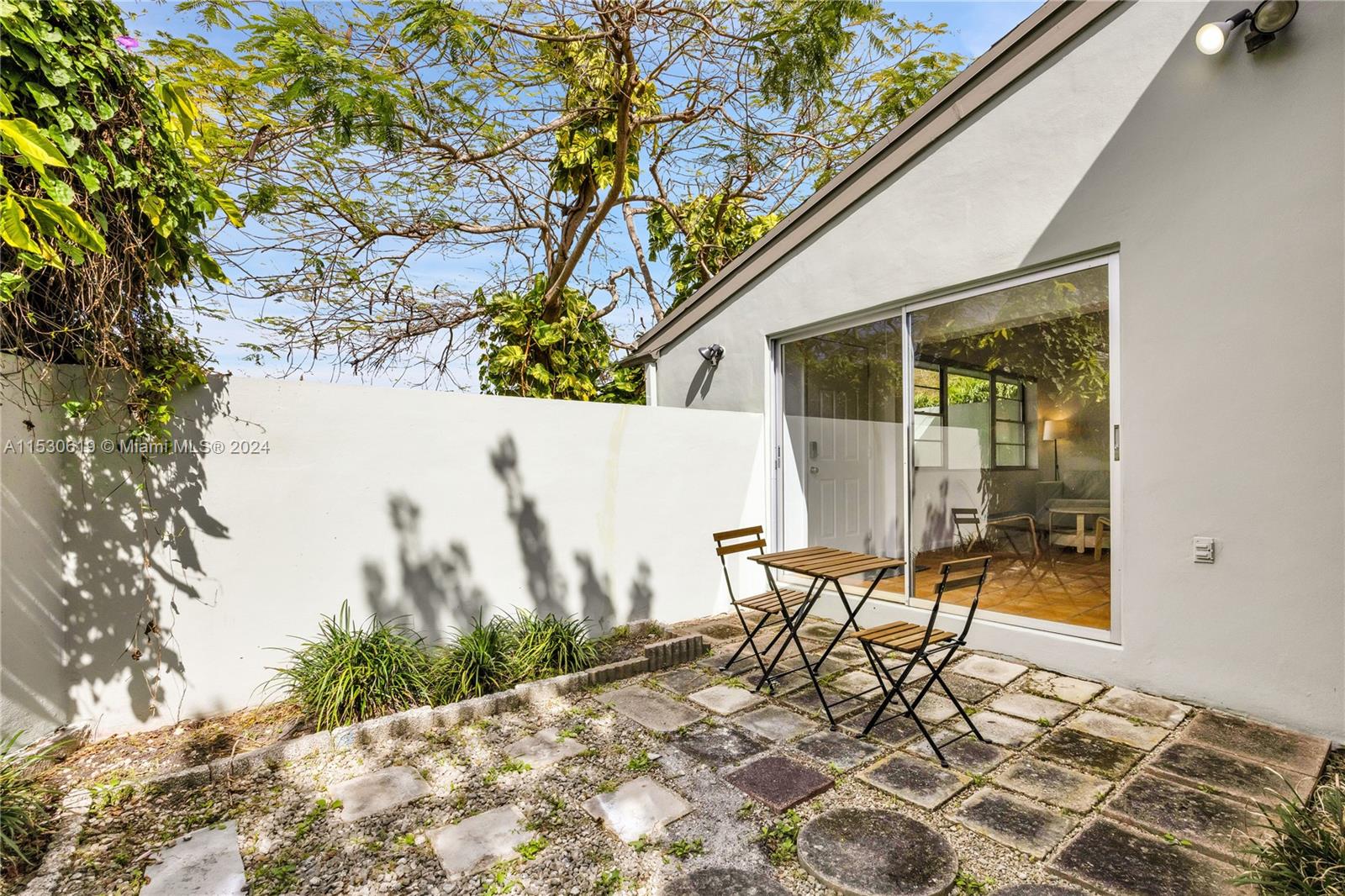 Side Courtyard with glass sliding door allowing for great natural lighting.