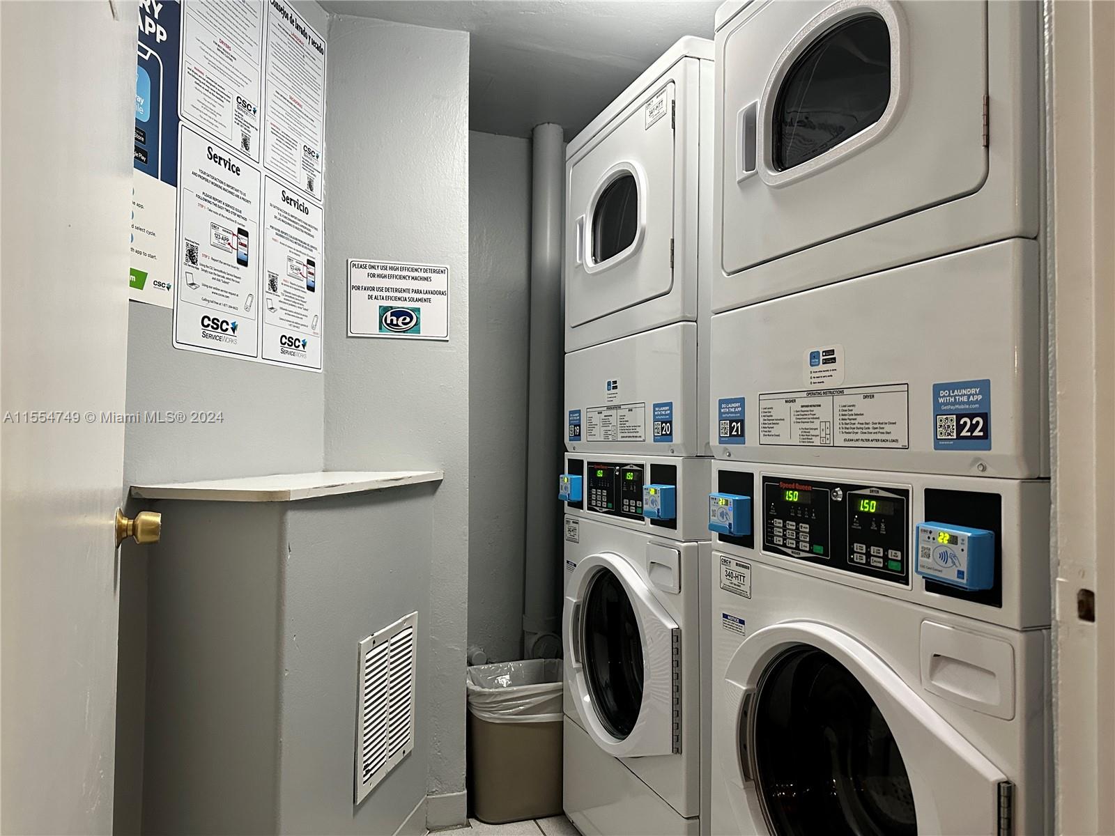 A set of Two Dryers and Two Washers are on Each Floor Of The Building