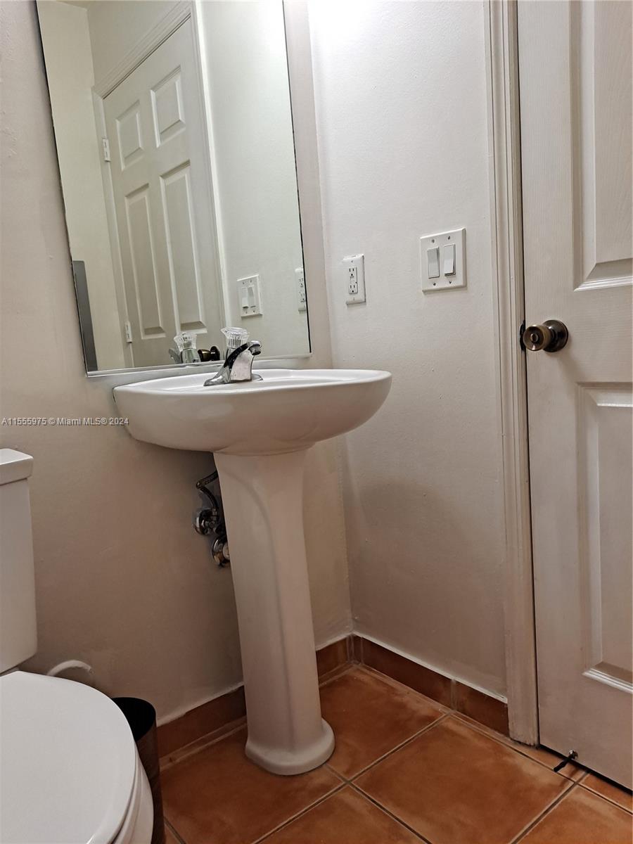 1/2 BATHROOM DOWNSTAIRS