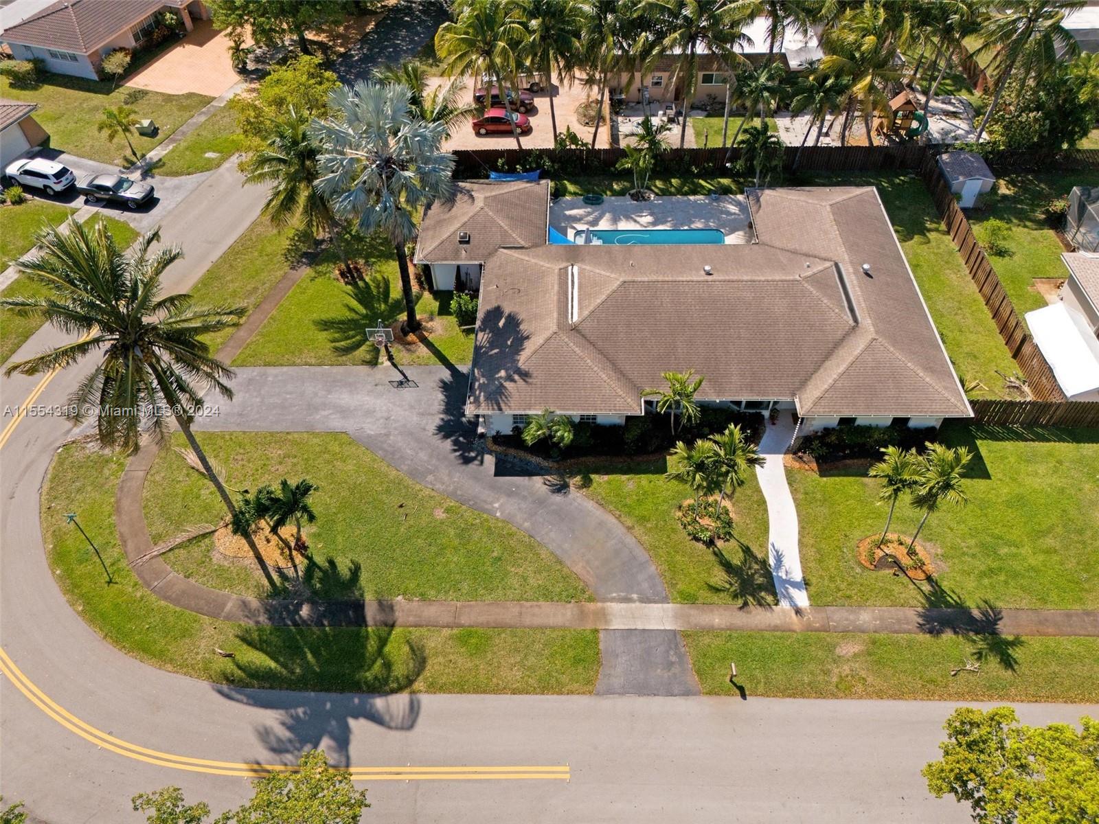 LARGE corner lot with plenty of parking.