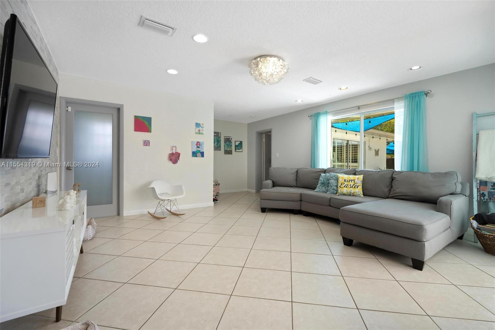 The second master suite is located just off the family room area