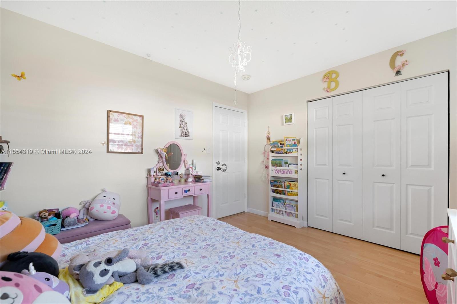 Spacious bedroom with wall to wall closet