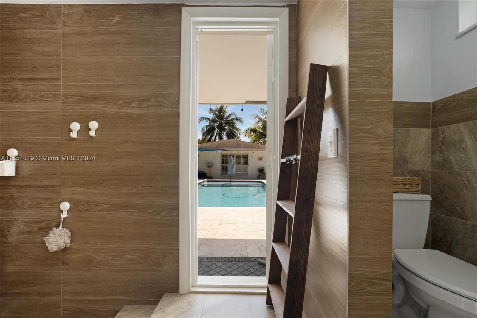 Upgraded master bathroom that has an exit to your backyard paradise.