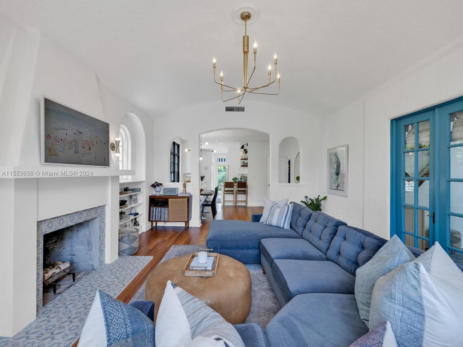 Main Living with Fireplace & Vaulted Ceiling