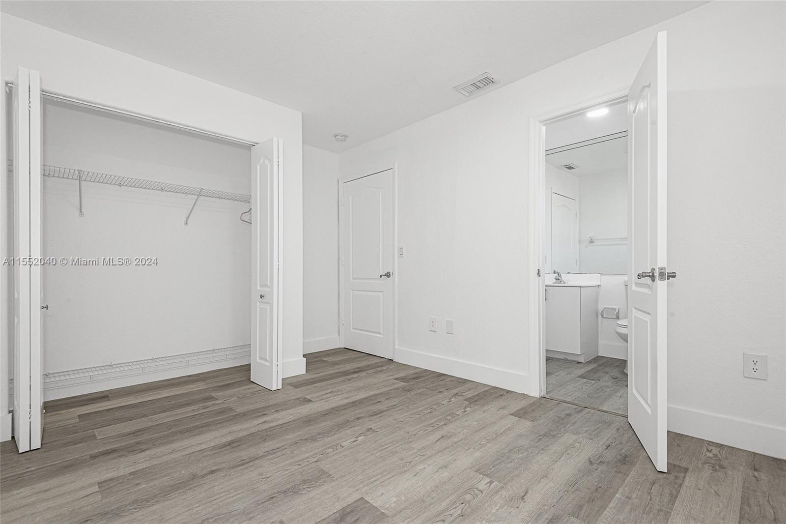 2nd bedroom with closet. Access to bathroom from second bedroom