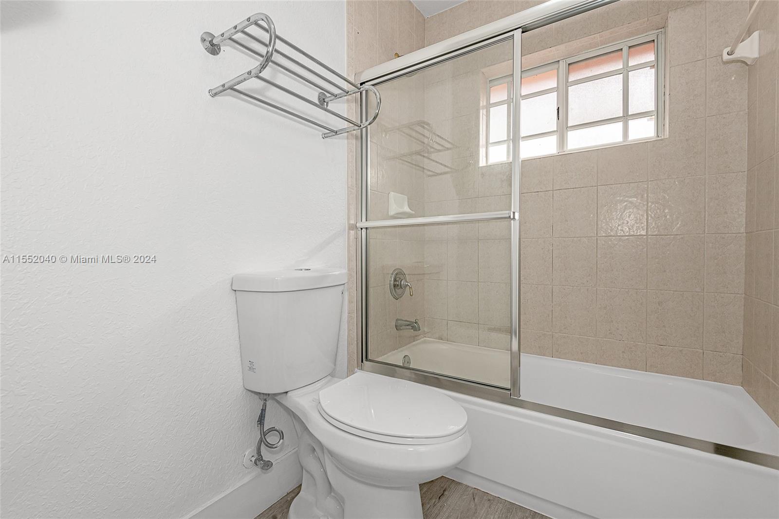 Huge room has space for cute shelf.