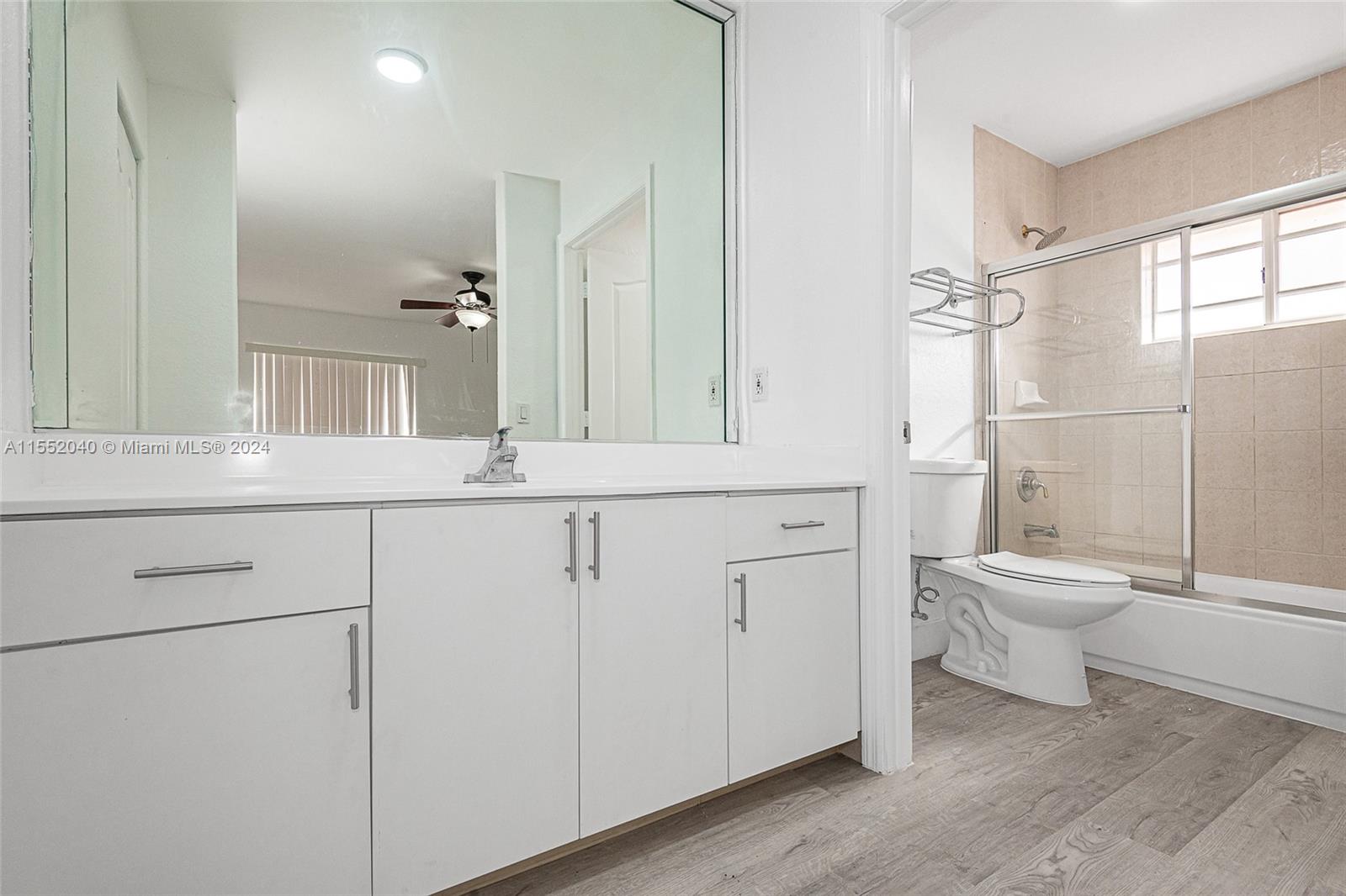 Door closes for private access to shower & toilet