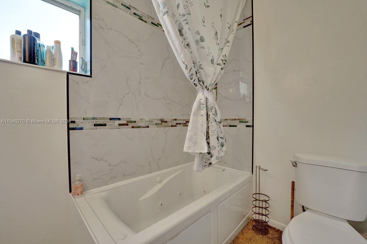 Master Jacuzzi tub and shower