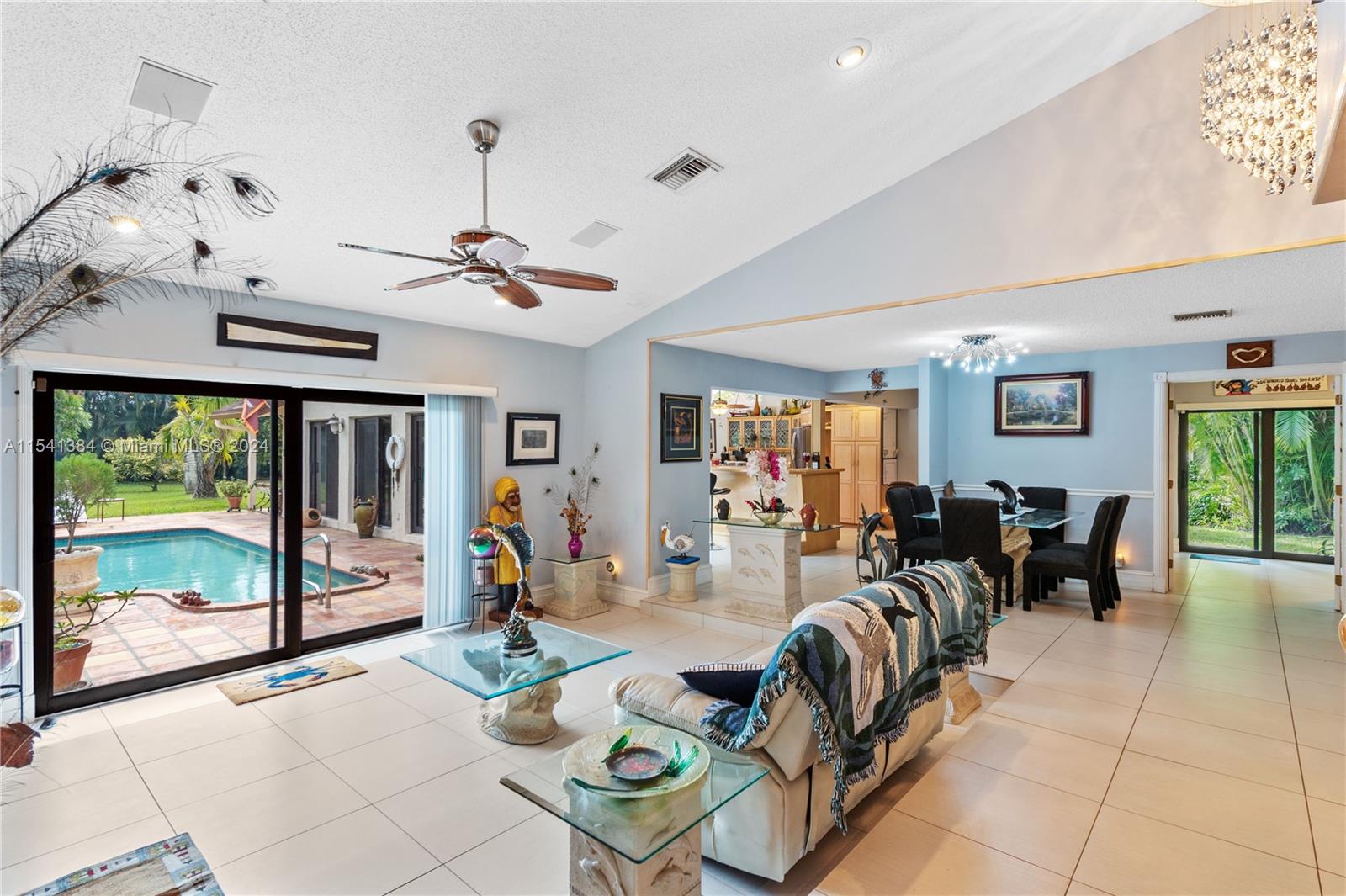 Looking out to pool area and enormous backyard.
