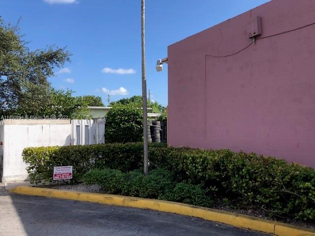 Path leading to parking behind building