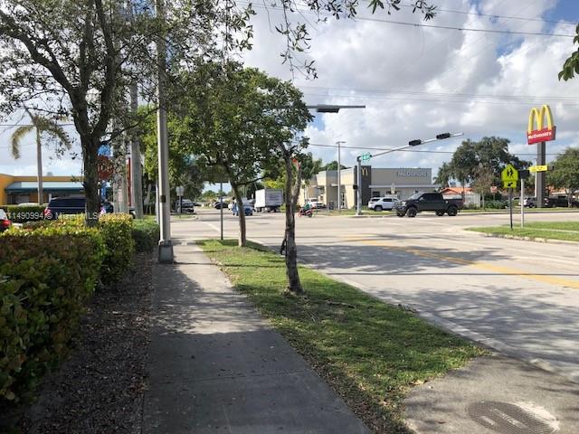 Main front street view & side residential area