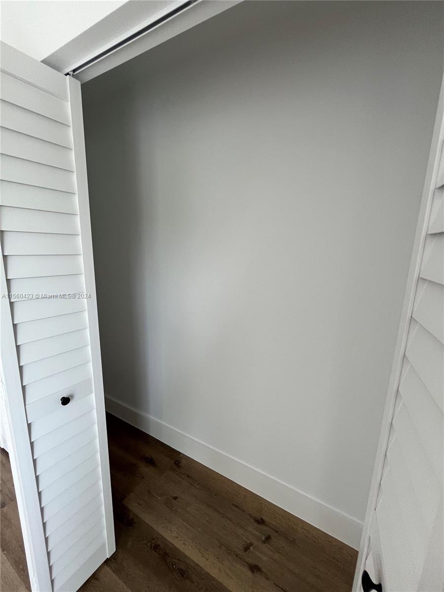 Upstairs bedroom closet view x2
