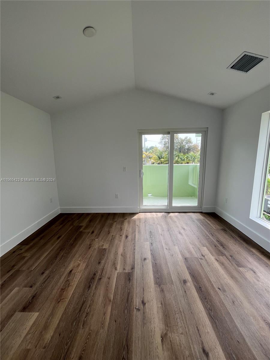 Master bedroom with balcony access