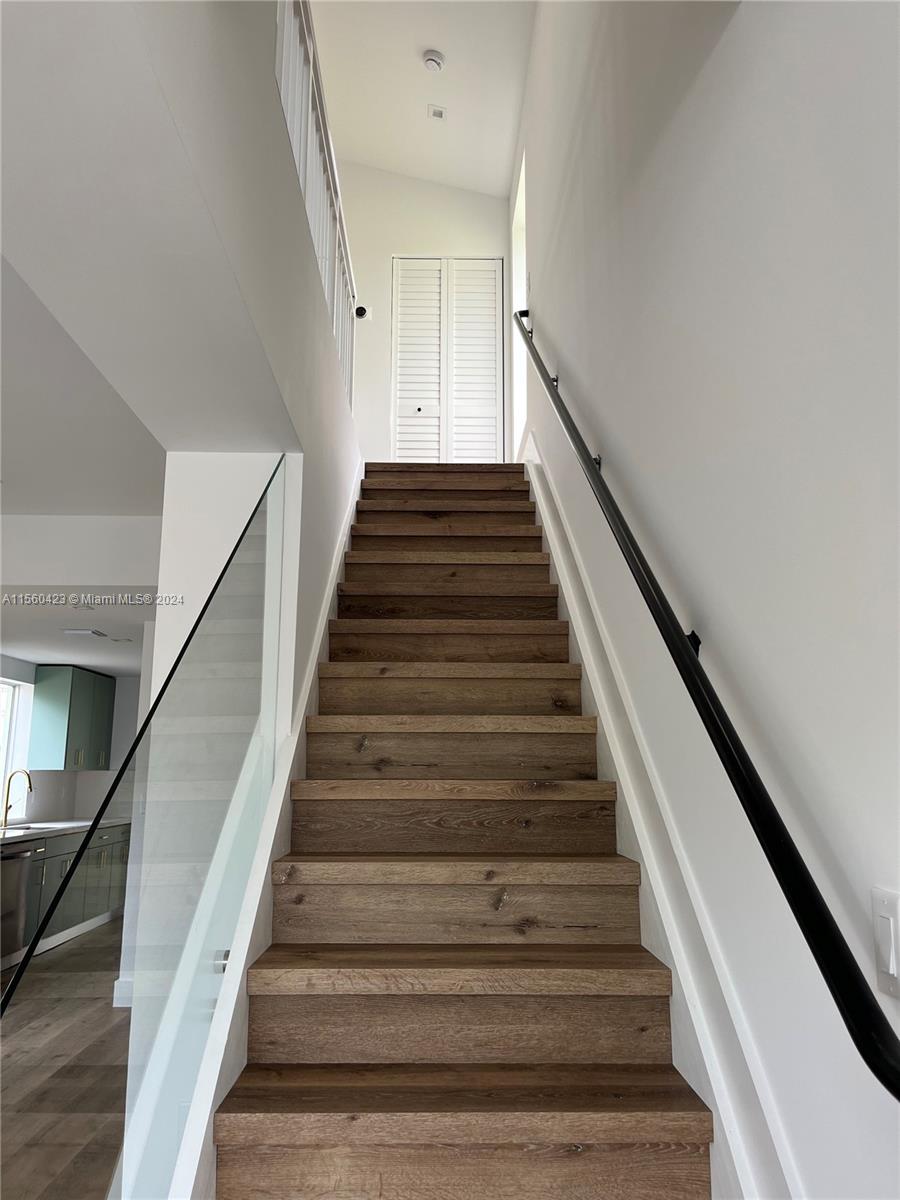 Stairs leading upstairs