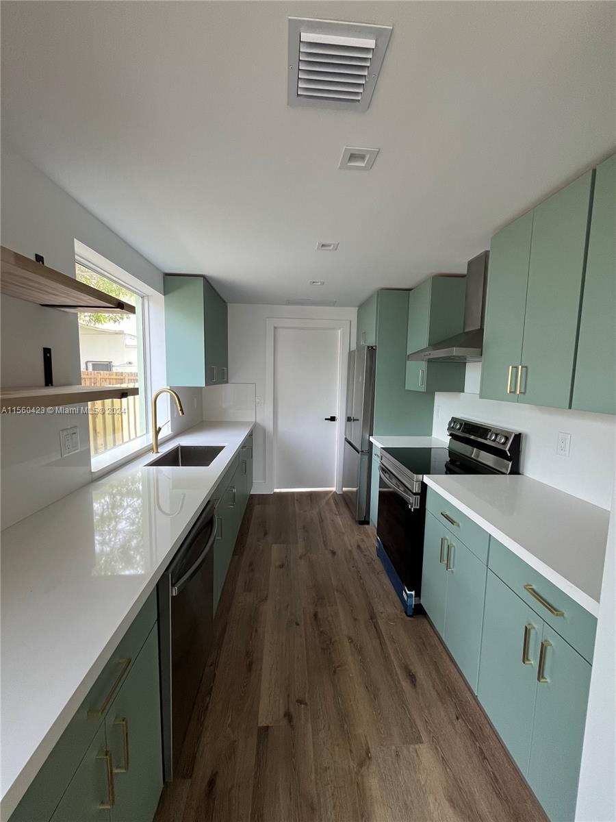 Includes all new dishwasher, oven, electric stove, garbage disposal, refrigerator and freezer