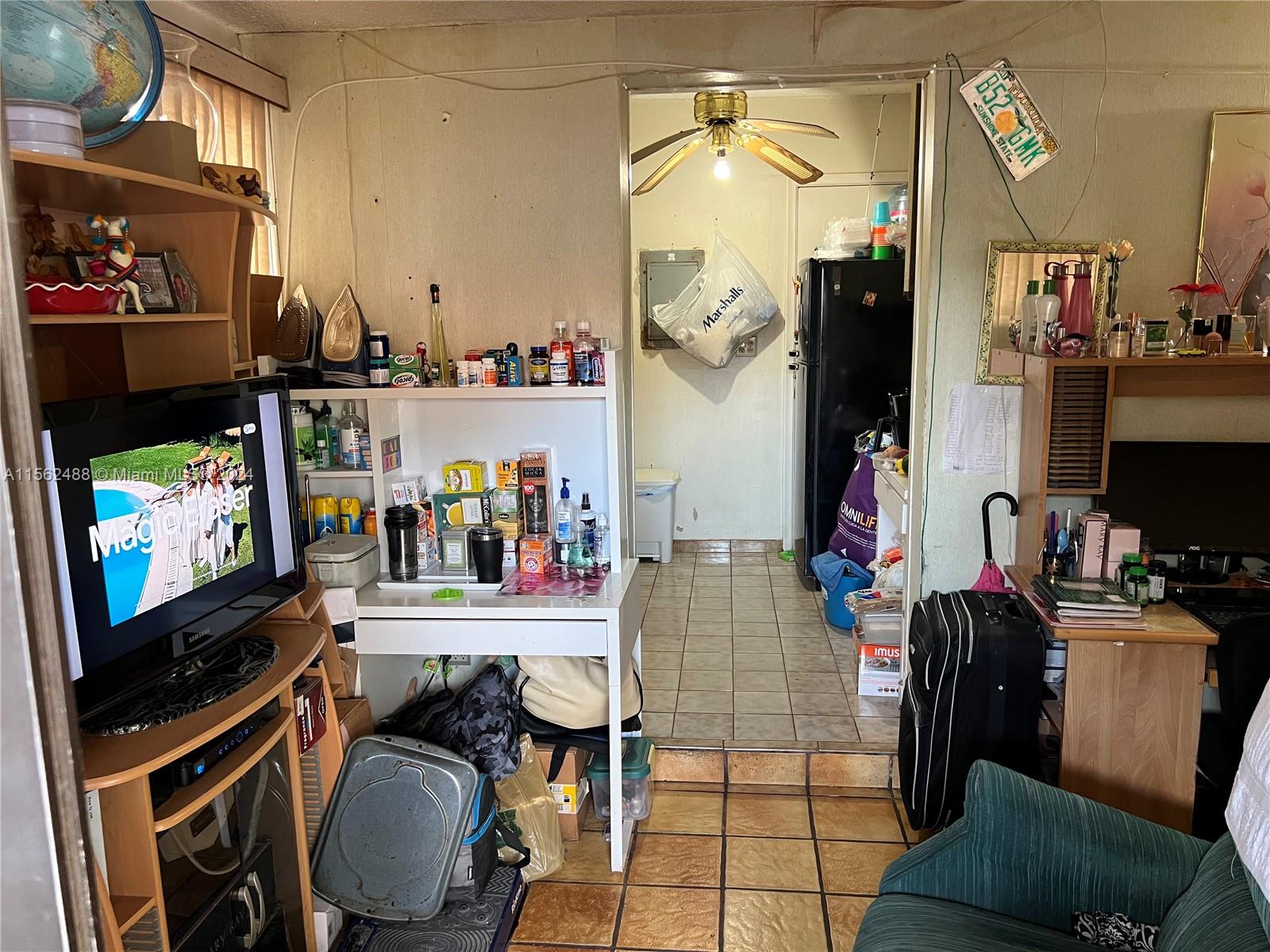 Rear 1/1 unit entrance to kitchenette